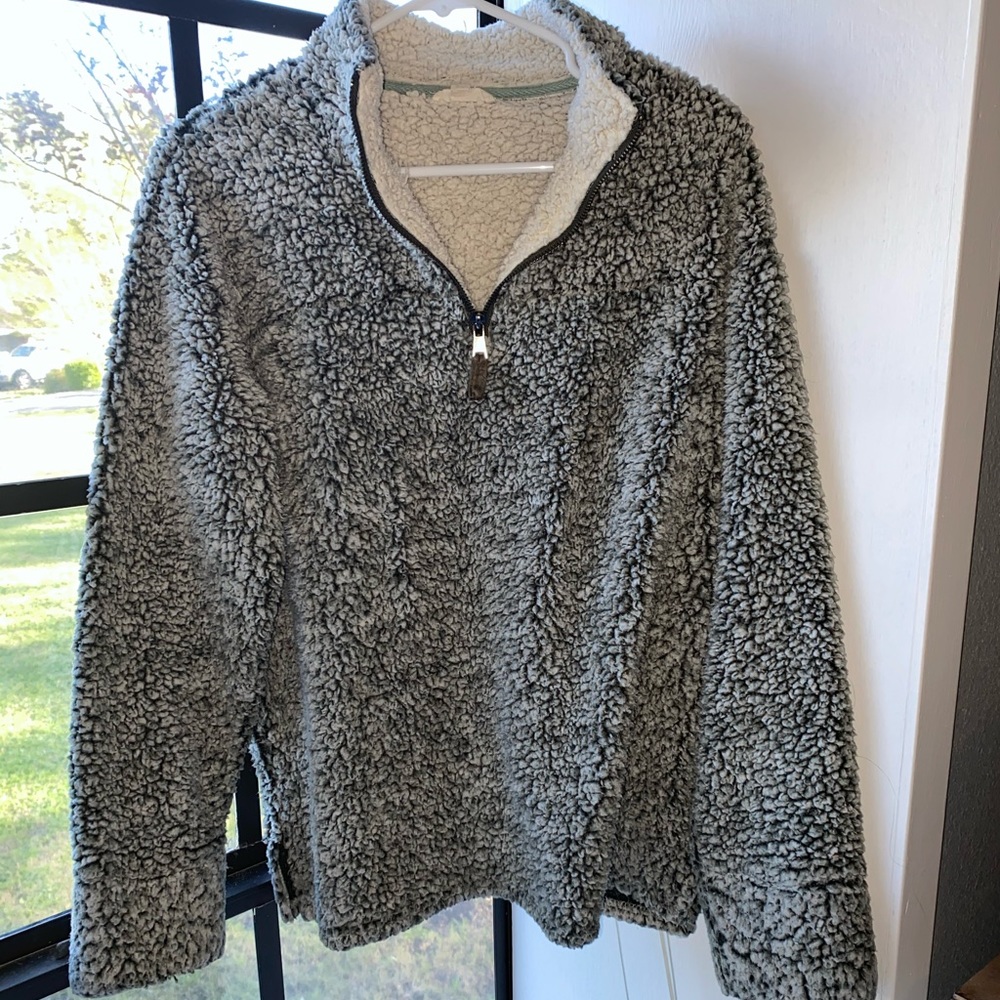 A white and green mix Sherpa.